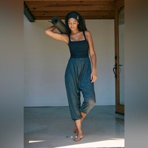 Free people movement shiny happy one piece in black size small